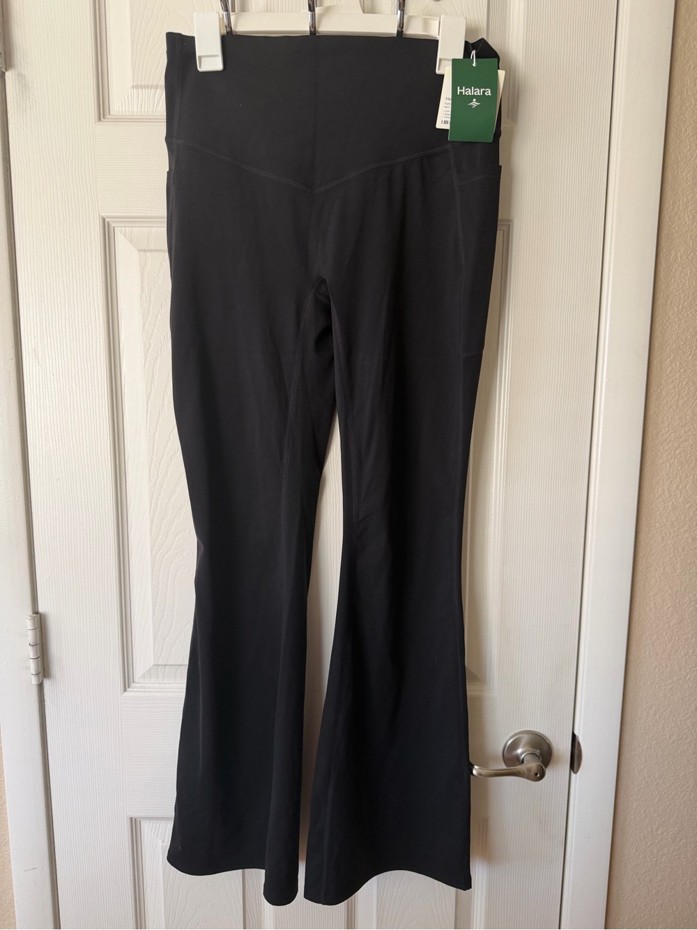 HALARA Black High-Waist Flare Leggings with Side Pocket - Picture 1 of 4